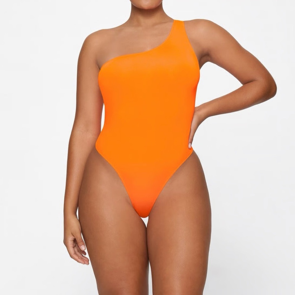 BNWT SKIMS NEON ORANGE ASYMMETRICAL BODYSUIT
